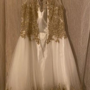 Fiesta fashion white and gold dress.